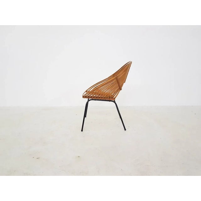 Dutch Rattan Lounge Chair from Rohe Noordwolde, 1950s, in Very Good conditions. Designed 1950 to 1959 This piece is...