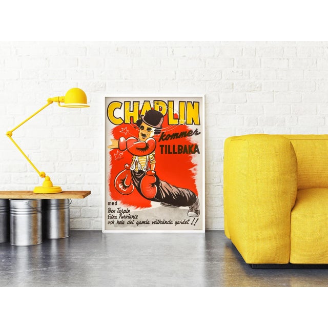 Charlie Chaplin takes a punch on this bold and eye-catching poster for the 1944 Swedish re-release of his 1915 silent...