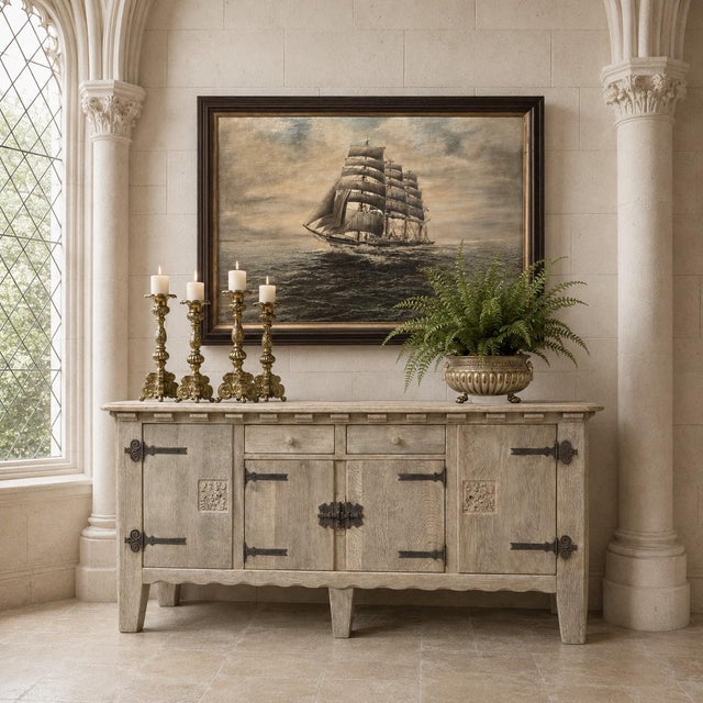 A striking Dutch buffet crafted from thick, heavy quarter-sawn oak, combining the strength and permanence of traditional...
