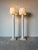 Elevate your interior with this striking pair of 1980s vintage faux pencil reed plaster floor lamps, featuring a...
