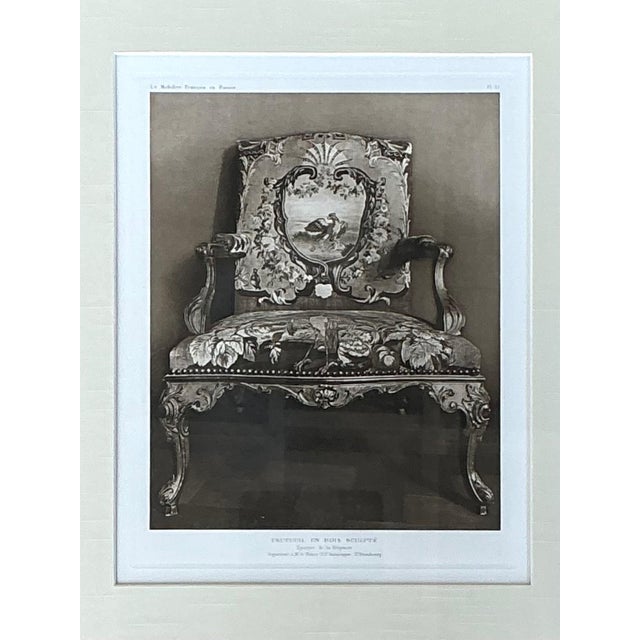 This elegant framed antique print presents a classic French chair design, beautifully rendered with attention to...