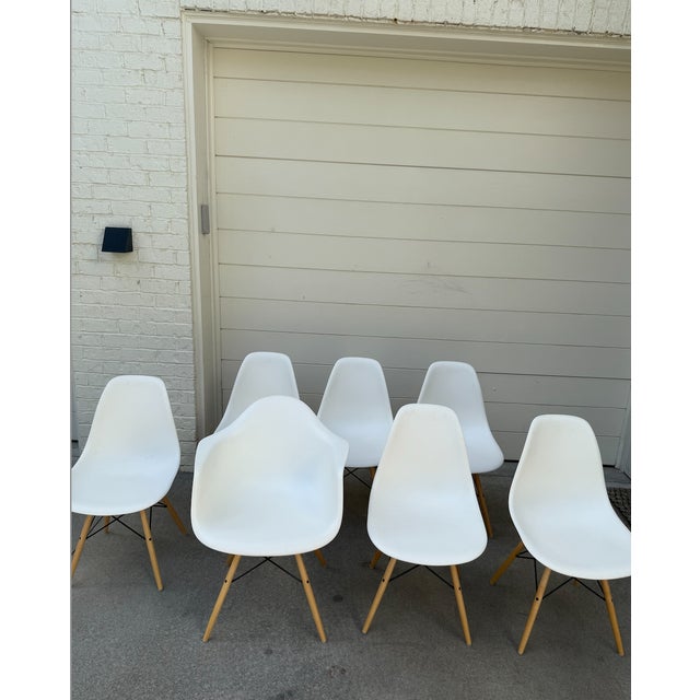 Offered is a set of 8 authentic Eames chairs. Six chairs are in identical matching set and two arm chairs shown in second...