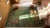 Soothing Green Color Minimalist Open Field and Floral Border Antique Chinese Art Deco Carpet For Sale - Image 11 of 12
