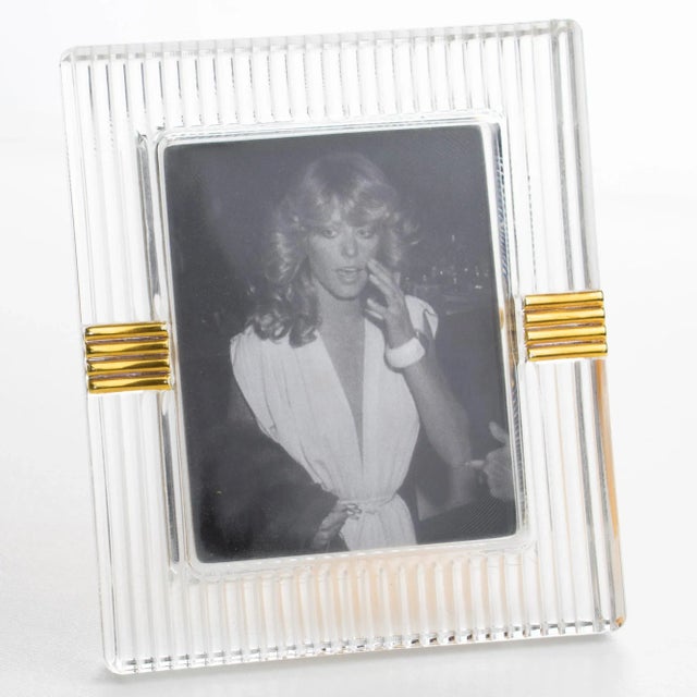 This stunning modernist picture frame was designed for the Christian Dior Home Collection. The piece was crafted in Japan...