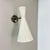 Brass theatre wall light sconce with diabolo shade element Origin: Italy Age: 1950s This modernist light was produced in...