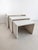 Set of 3 travertine nesting tables from 1980's Italy. Crafted from natural travertine, these nesting tables radiate a...