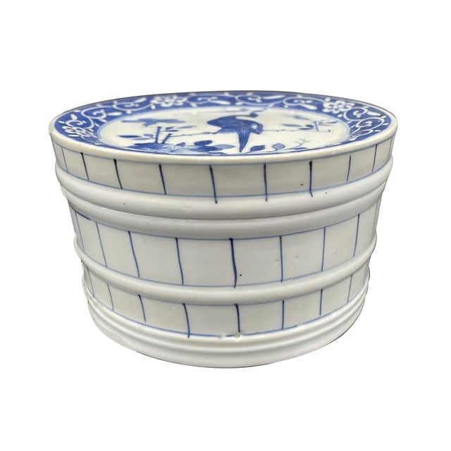 Beautiful Blue and white covered porcelain box from the Meiji period. Decorated with a long-tailed bird on a flowering...