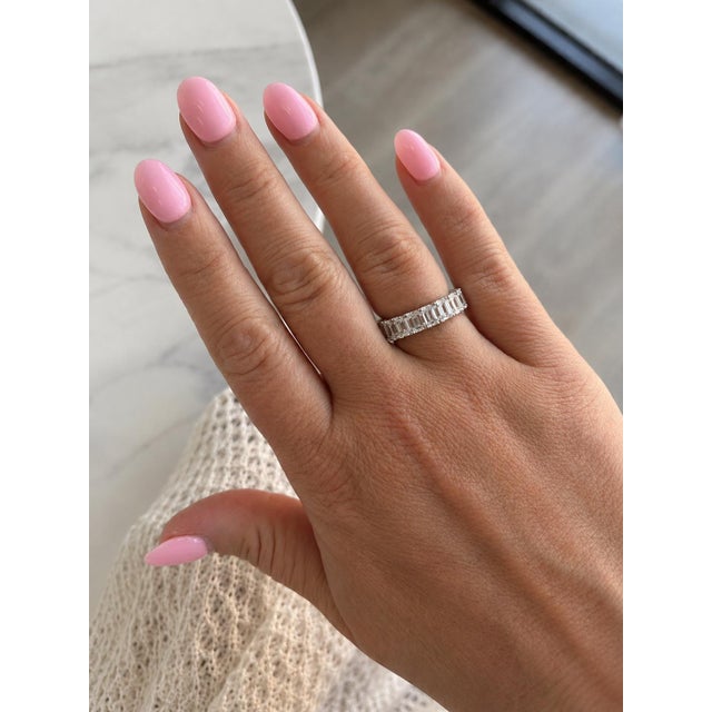 This amazing emerald cut eternity band contains 20 GIA graded emerald cut diamonds weighing 6.28 carats total. Mounted in...
