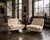 A sophisticated pair of Vioski swivel lounge chairs designed in 2004 and upholstered in luxurious champagne-toned mohair....
