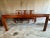 Elegant Mid 20th Century Chinese Ming style solid rosewood dining set, including a dining table with one leaf, 2 arm...