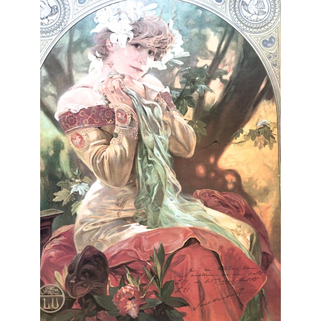 An evocative piece of French advertising history, this vintage decorative poster reproduces an exquisite Art Nouveau...