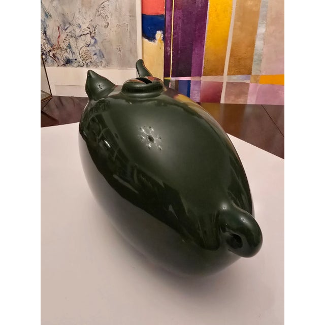 A rare vintage original piggy bank porcelain sculpture depicting a whimsical cartoonish fat pig figure. Having a superb...