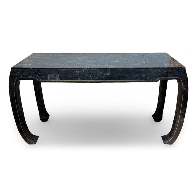 20th century Hollywood Regency tessellated stone console table by Maitland-Smith. Featuring elegantly curved legs and a...