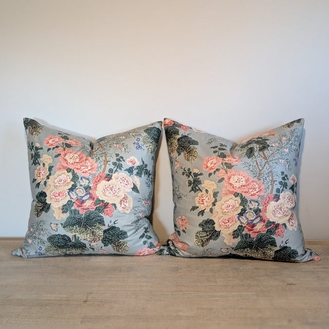 Lee Jofa Althea print chintz is a pretty grandmillenial flora with pinks and creams and a light aqua background....