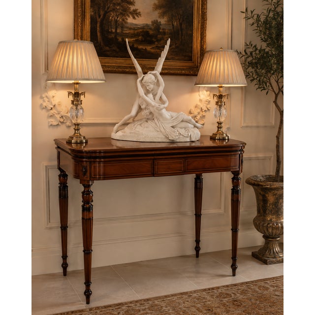 A very elegant george iii mahogany inlaid card table dating to circa 1800, designed to serve equally well as a console or...