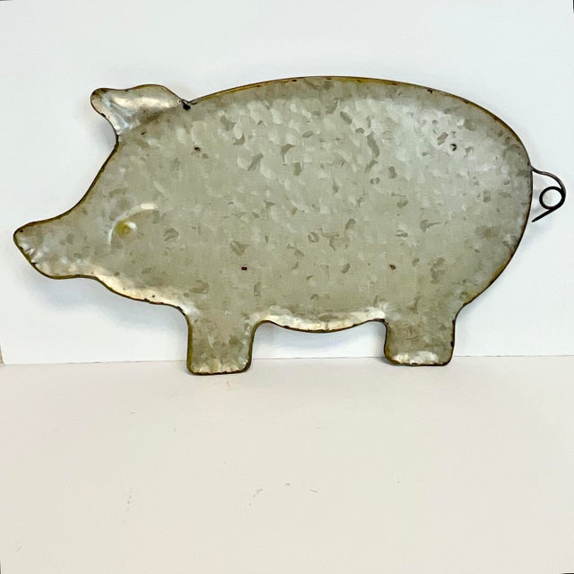 The word that comes to mind is “delightful”. We love this pig-shaped galvanized steel tray. It’s from the 1980s and has a...