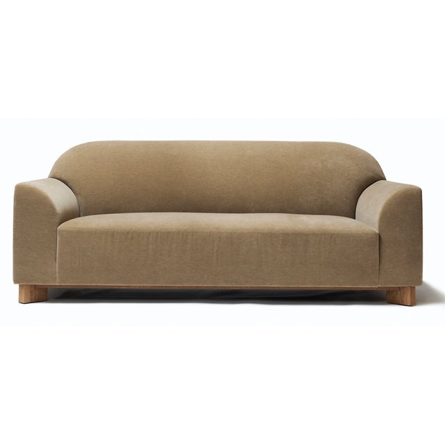 Holland & Wilshire sofa upholstered in Holland and Sherry Rambouillet grain color plush mohair. Tight back and seat with...