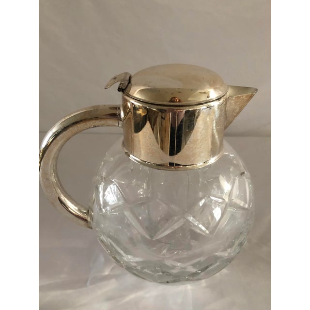 These beautiful crystal pitchers are becoming harder and harder to find . Made in Germany, with a cooling insert to keep...