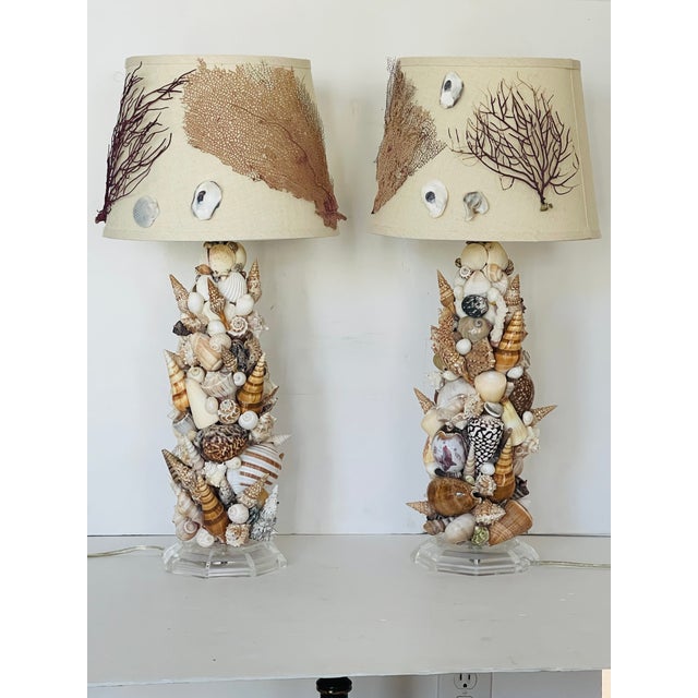 Fabulous pair of coastal grotto style table lamps including sea shells, corals, sea whip branches, amethyst geods ,...
