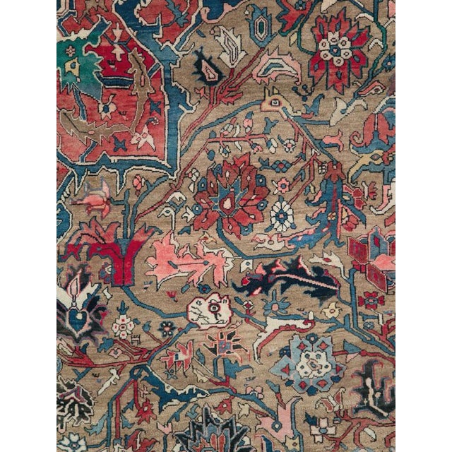 This mid-20th-century Persian Afshar rug presents a restrained geometric composition in warm beige, sand, ivory, and soft...