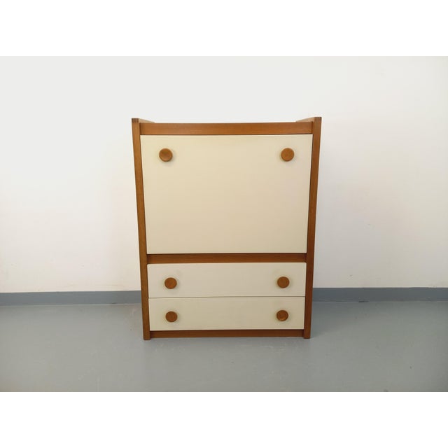 Vintage 1970s secretary desk/storage unit in oak and off-white melamine, on a solid plinth, with attractive oak handles....