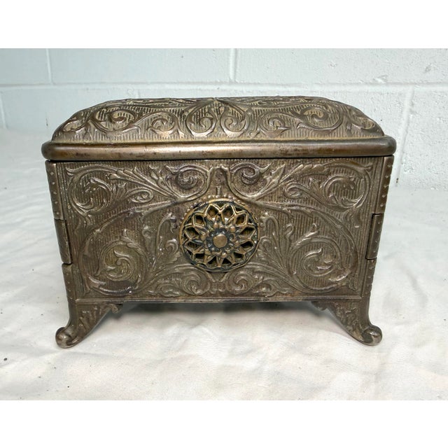 Up for sale is a rare antique ornate 1890's Cast Iron Jewel Chest (Coffin Bank) by Hart Co. USA. This unique piece is an...