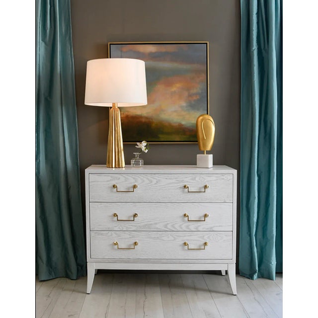 Make everyday an occasion with our Hensley table lamp inspired by celebratory tassels. Hand-finished with gold leaf and...