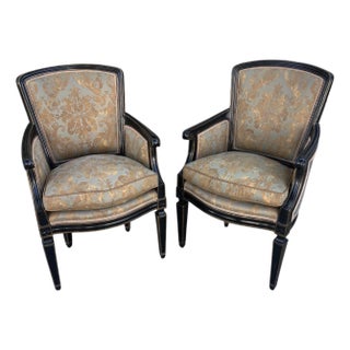 Pair of Fortuny Upholstered Directoire Style Gilt Ebonized Arm Chairs For Sale