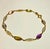 This elegant vintage Italian bracelet combines warm 14K yellow gold with a colorful assortment of faceted gemstones in a...