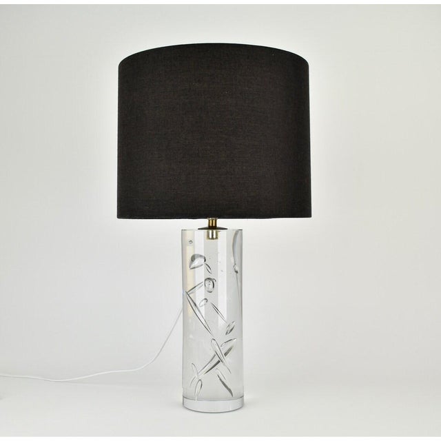 Stunning solid lead crystal table lamp. Inside the cylindrical shaped base are enclosed bubbles. Mesmerising to look at!...