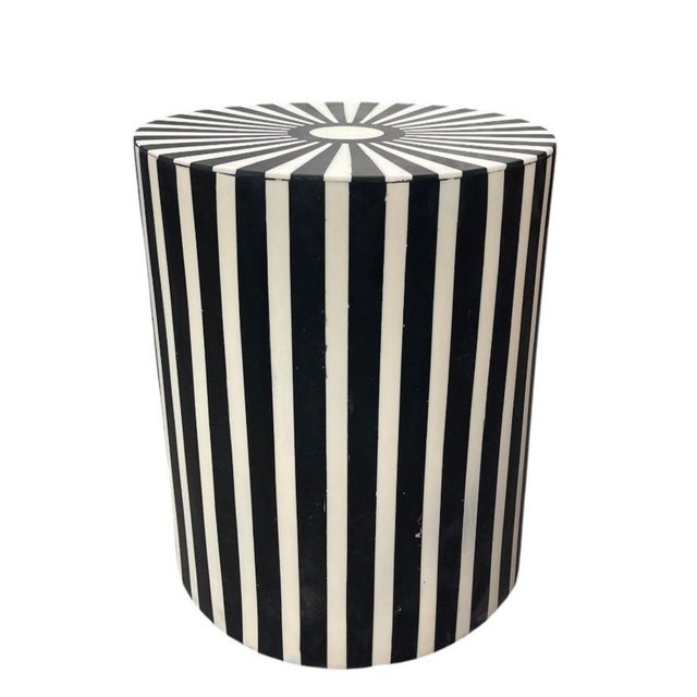 Make a bold graphic statement with this striking vintage drum-style side table, crafted with a sturdy wooden core and...