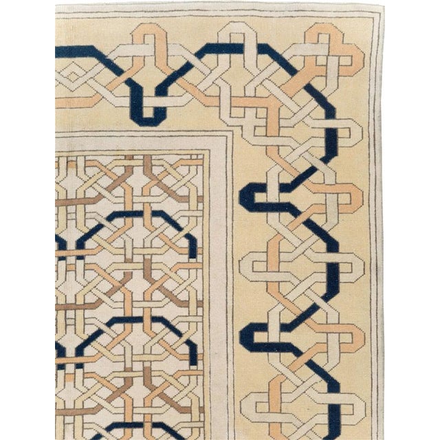 A vintage Turkish Anatolian Art Deco style accent rug handmade during the Mid-20th century. Measures: 5' 4" x 7' 8"