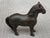 Sweet, small antique cast iron horse piggy bank. Slot on the lower part of his mane. Heavy. No marks. Great condition....