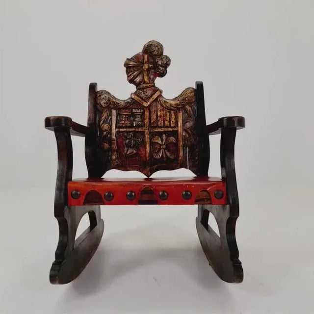 Antique spanish solid wood rocking armchair hand-carved, 1900s. Great condition. Dimensions: h: 91 cm, w: 62 cm, d: 67 cm,...