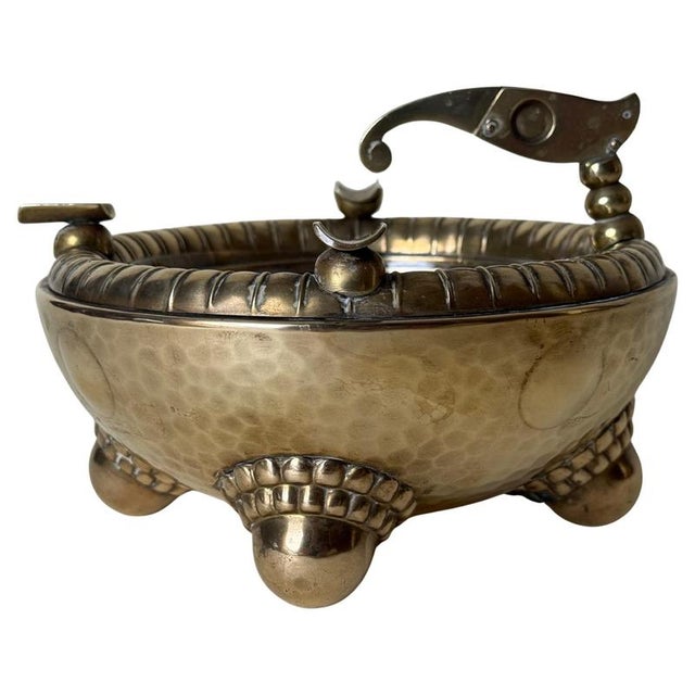An extraordinarily refined and highly sculptural Art Deco ashtray, most likely crafted in Austria during the 1920s or...