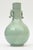 This beautiful Asian Chinese celadon green porcelain vase is vintage from the 50's. It has handles on the side with asian...
