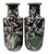 A fantastic pair of detailed and dramatic porcelain vases, the main decorative element comprised of mirrored flowering...