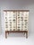1950's Swedish Cabinet later papered with Bird Illustrations by Édouard Traviés. 2 Large doors conceal interior shelves...