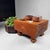 Complete vintage Japanese Go set, consisting of a wooden goban, two lidded containers with black and white Go stones,...