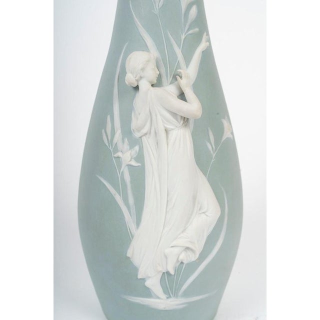 Weshwood vase with a relief of a woman, circa 1900, Art Nouveau. Art Nouveau-era vase, circa 1900, made of Weshwood...