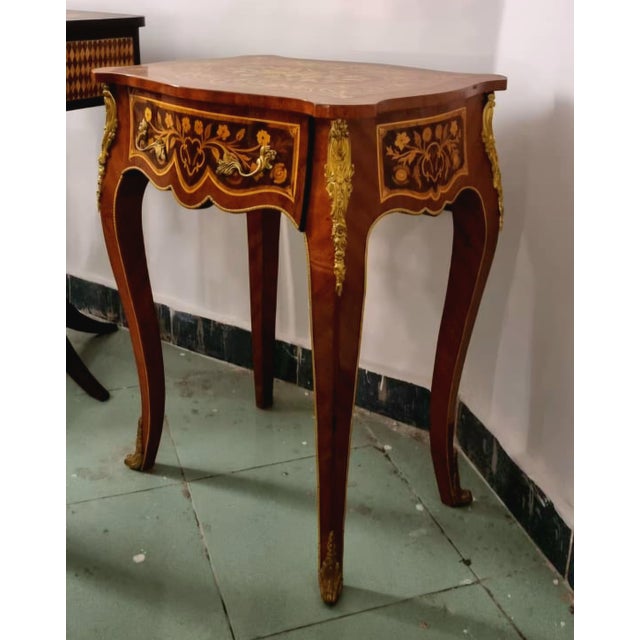 Add refined French elegance to your interior with this Louis XV-inspired side table, featuring a beautifully shaped...