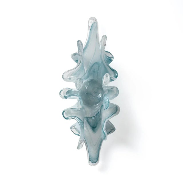 Vintage Murano hand-blown glass sculpture, typically used as a napkin or letter holder. This piece captures the fluid...