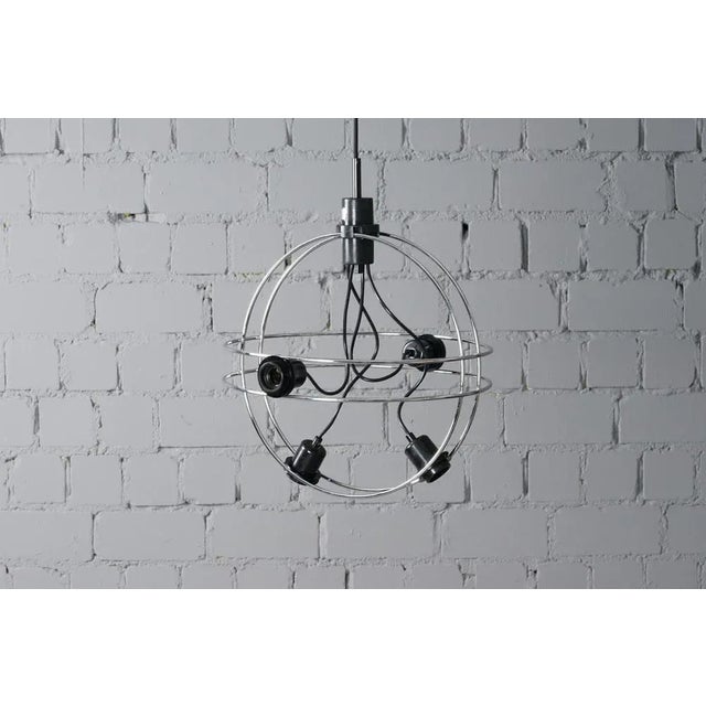 Vintage ceiling lamp model cirkels mobile b-1021 designed by walter leeman for raak around 1975. The alignment of the...