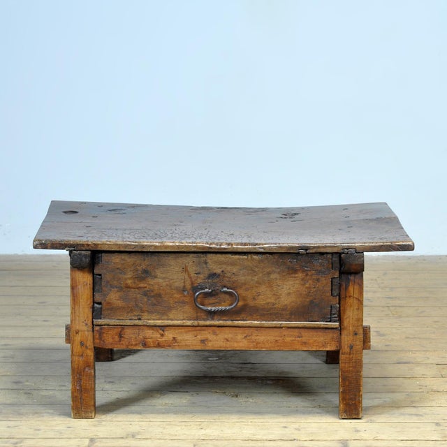 This Spanish table, crafted from solid chestnut wood, dates from the late 17th or early 18th century and constitutes a...