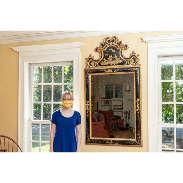 A large, exceptional and gorgeous 20th century intricately-carved and hand-painted chinoiserie gilt wood mirror with...