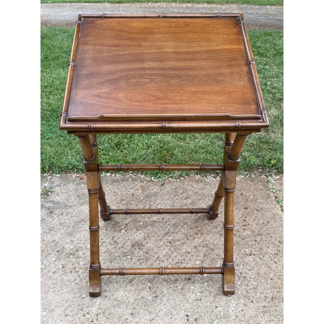 A vintage faux bamboo wooden lectern library book display stand. This piece features an adjustable slanted top which can...