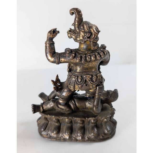 17th or 18th Century Chinese Sino-Tibetan Gilt Bronze Buddhist Makala Faced Deity Figure For Sale - Image 15 of 18
