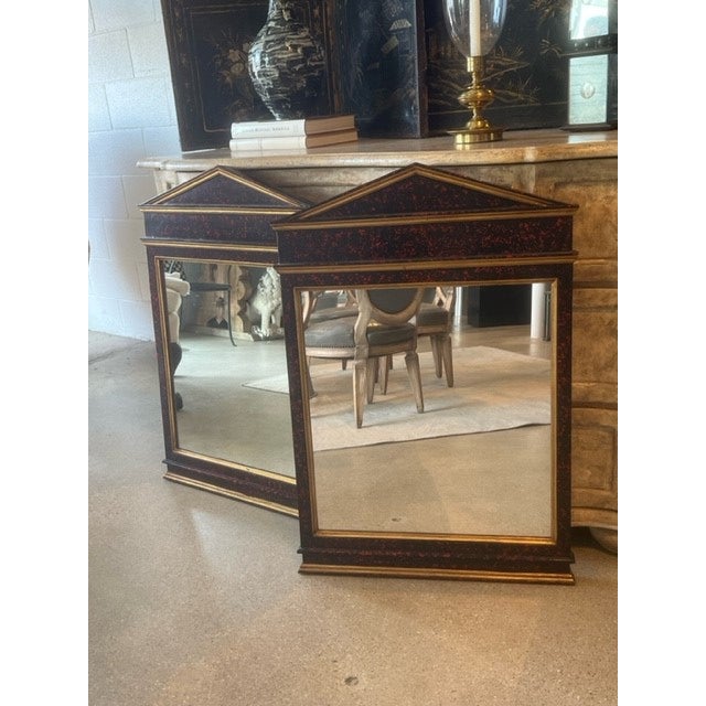 Very desirable pair of Neoclassical mirrors with pediment design originally made in Italy,. Neo-Classical Empire style of...