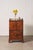 Georgian mahogany night cabinet with an inlaid gallery top, paneled door, and interior shelf.