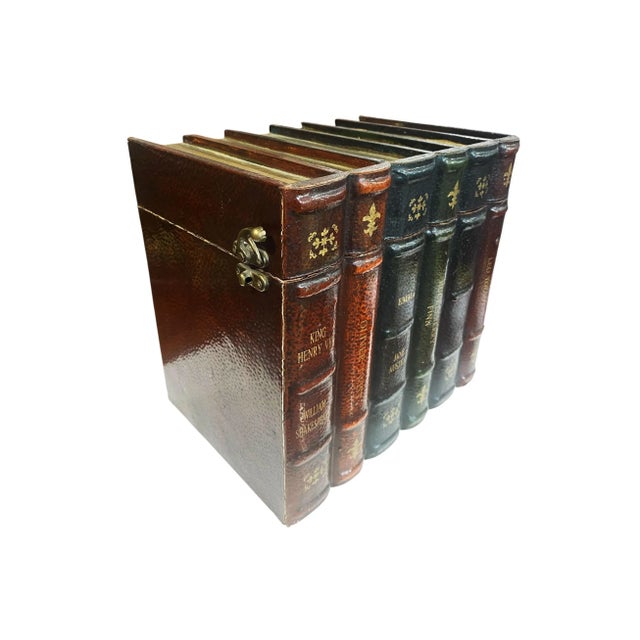 This vintage wooden box, designed to resemble a stack of books, features a lid and measures 10.25" wide, 7" deep, and 9.5"...